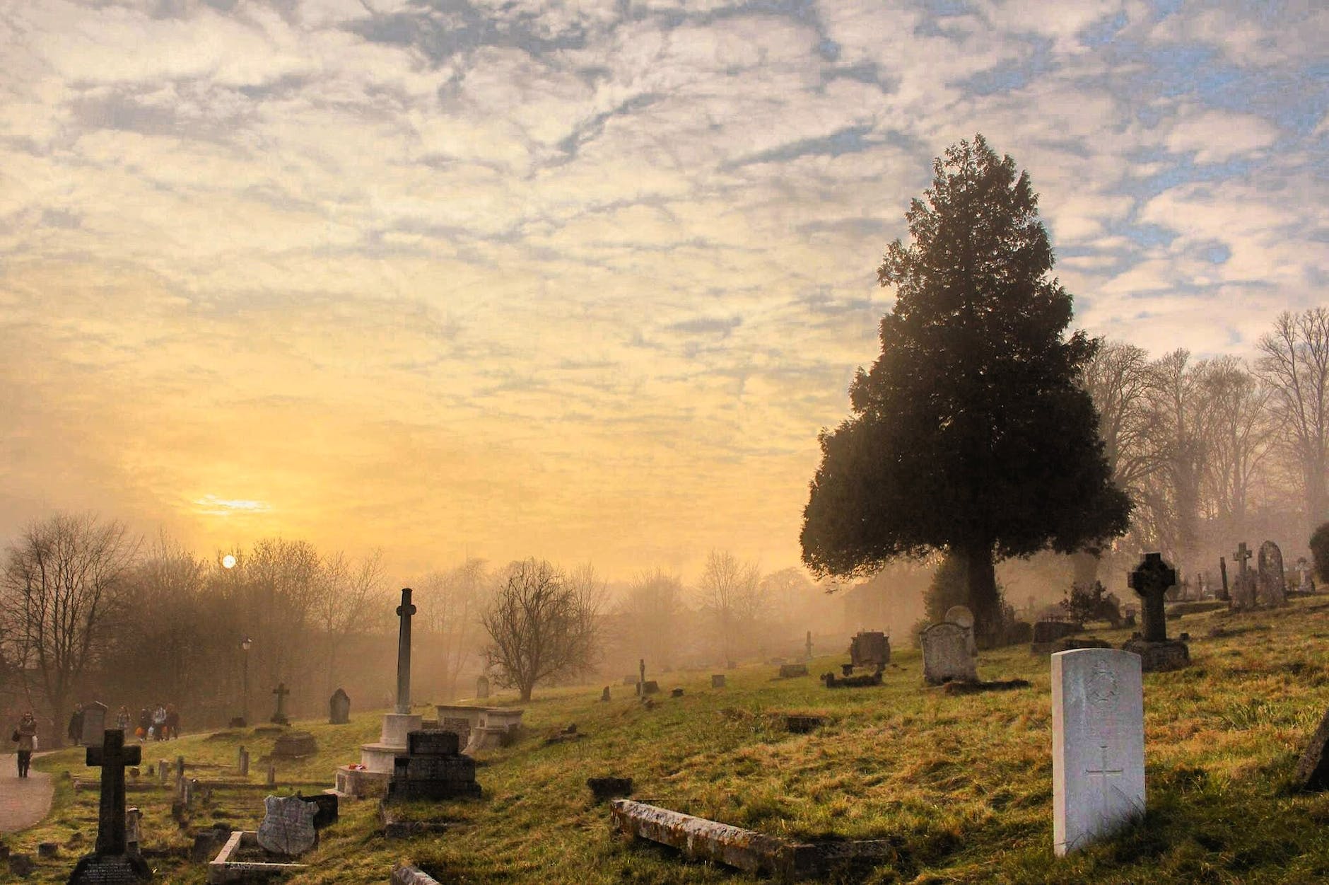 cemetery under the cloudy sky