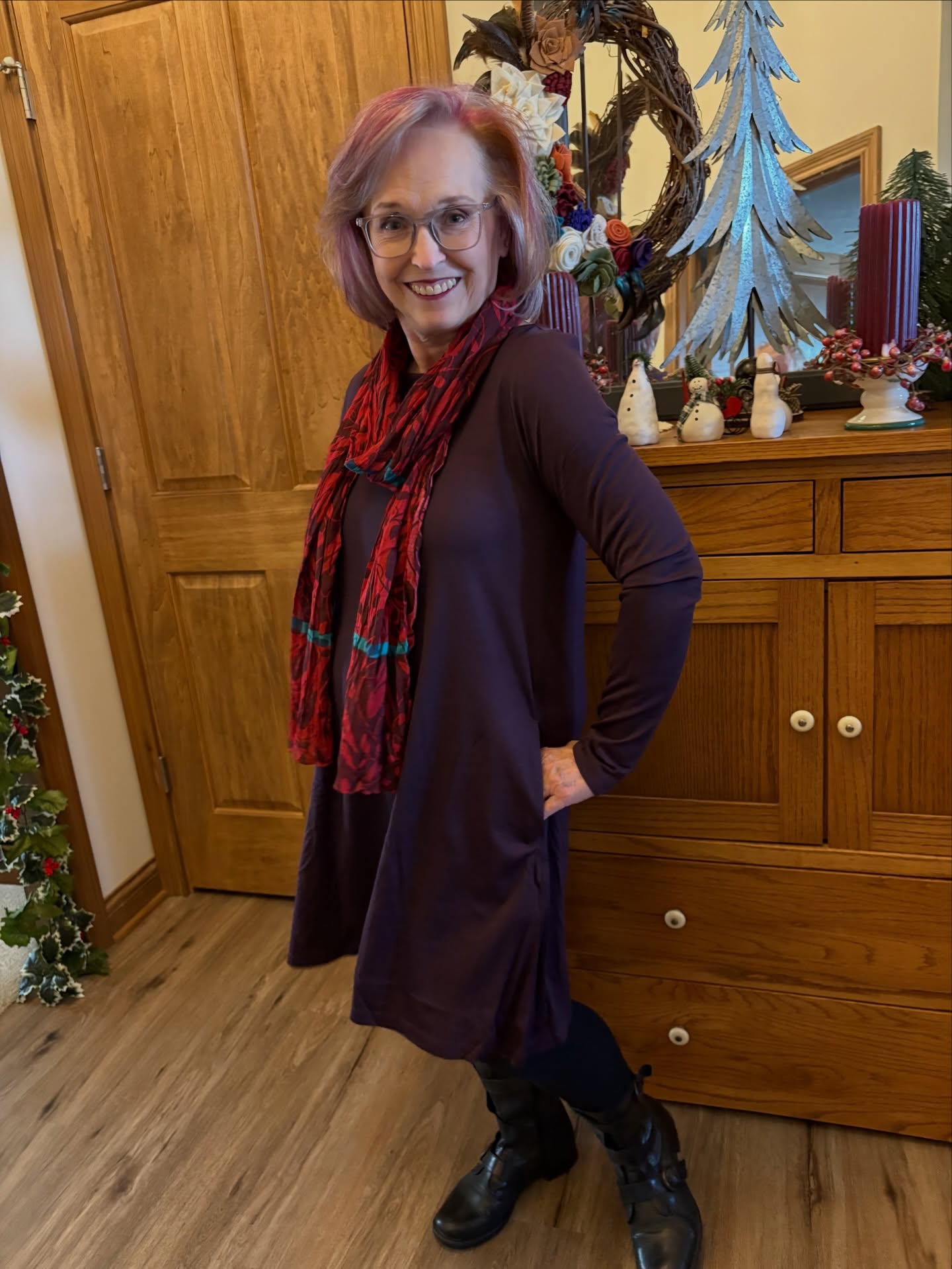 It’s Day 6 of the #100daysdresschallenge and I went simple…just draped a scarf around my neck because I’m just finishing up decorating the house.  Living the ease of this dress, I have to say! @wool.and #wooland #rowenadress #styleoversixty #over60style #over60andfabulous #over60fashion #gettingcloserto70 #styleatanyage #silversisters #wearascarf #wooldresschallenge