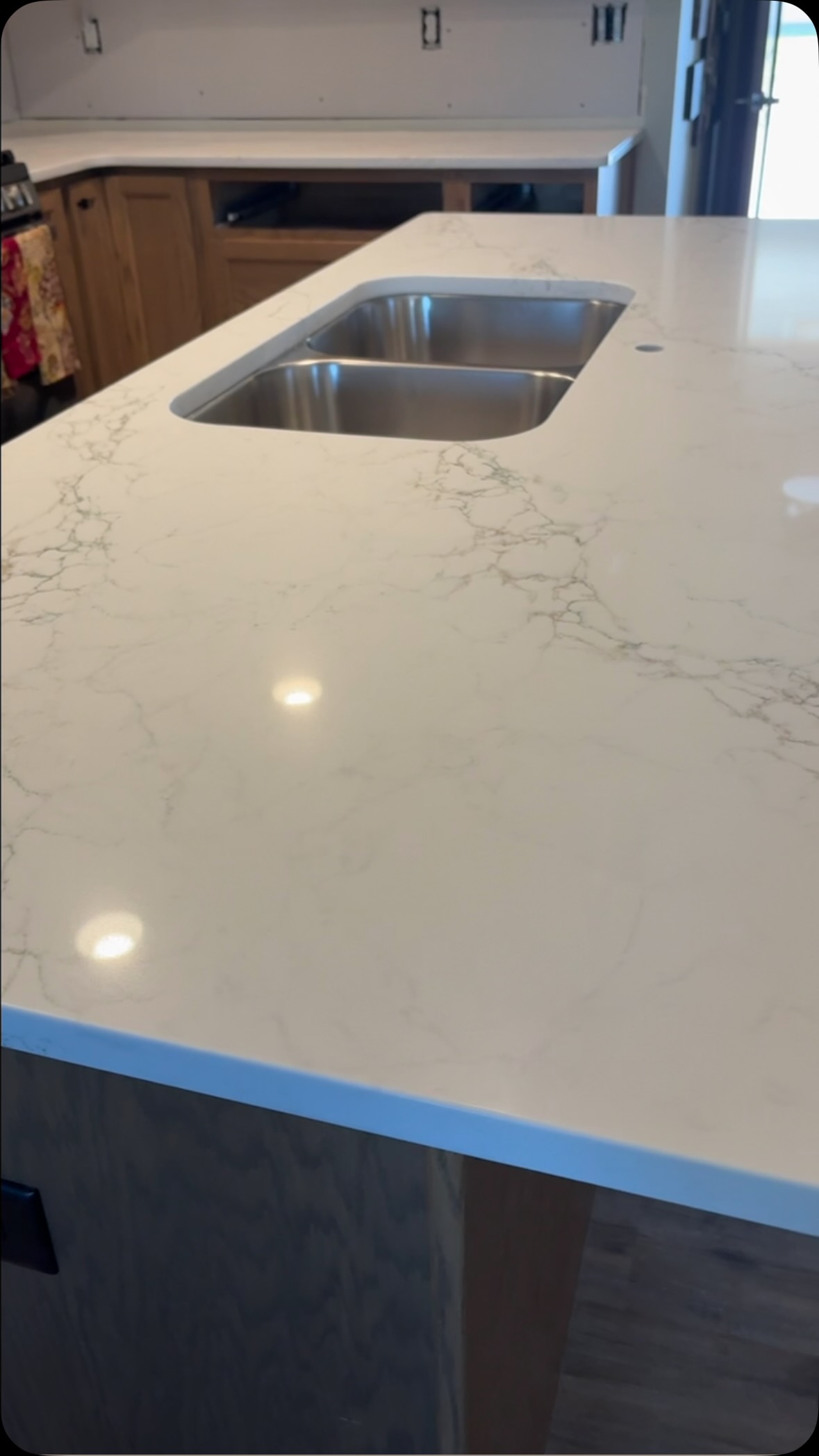 The quartz is in!  The faucet is, too, but I didn’t take a photo of it.  Ready to take up the flooring but got sideswiped by a bug!  #kitchenreno #calacattaquartz #gettingthereslowly