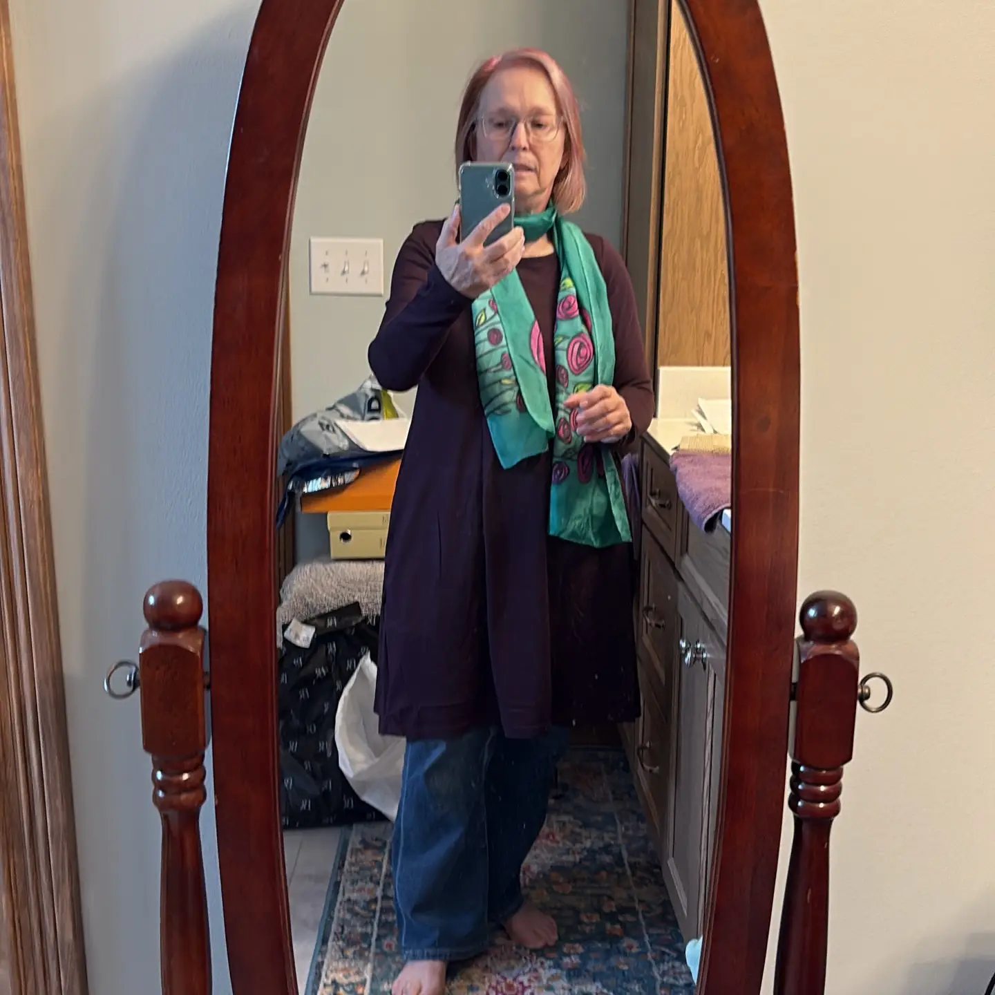 Day 5 of the #100daydresschallenge It’s cold and damp and everything icky.  So, today is about comfort…wearing my @wool.and Rowena dress over jeans with a silk scarf I hand painted.  I didn’t even put on makeup, but some days you just stay home and relax!  I wasn’t sure about dress over jeans, but I’m kinda digging it! #styleatanyage #styleover60 #over60style #ishallwearwhatiwant #over60andfabulous #rowenadress